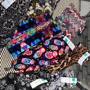 Lot of 8 pairs of kids leggings new with tags by Agnes and Dora size smalll med